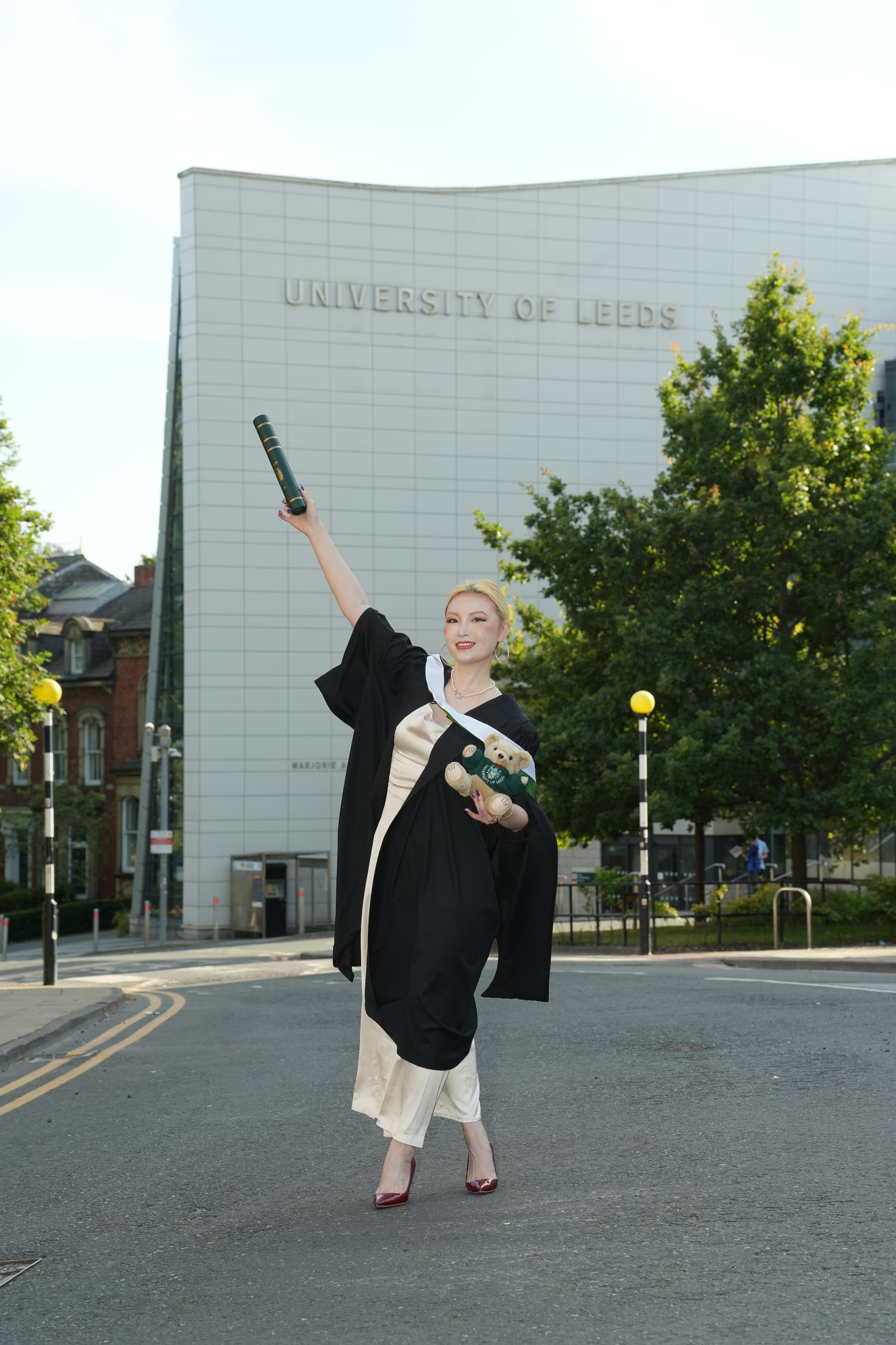 Kay Zhou celebrating her graduation at the University of Leeds